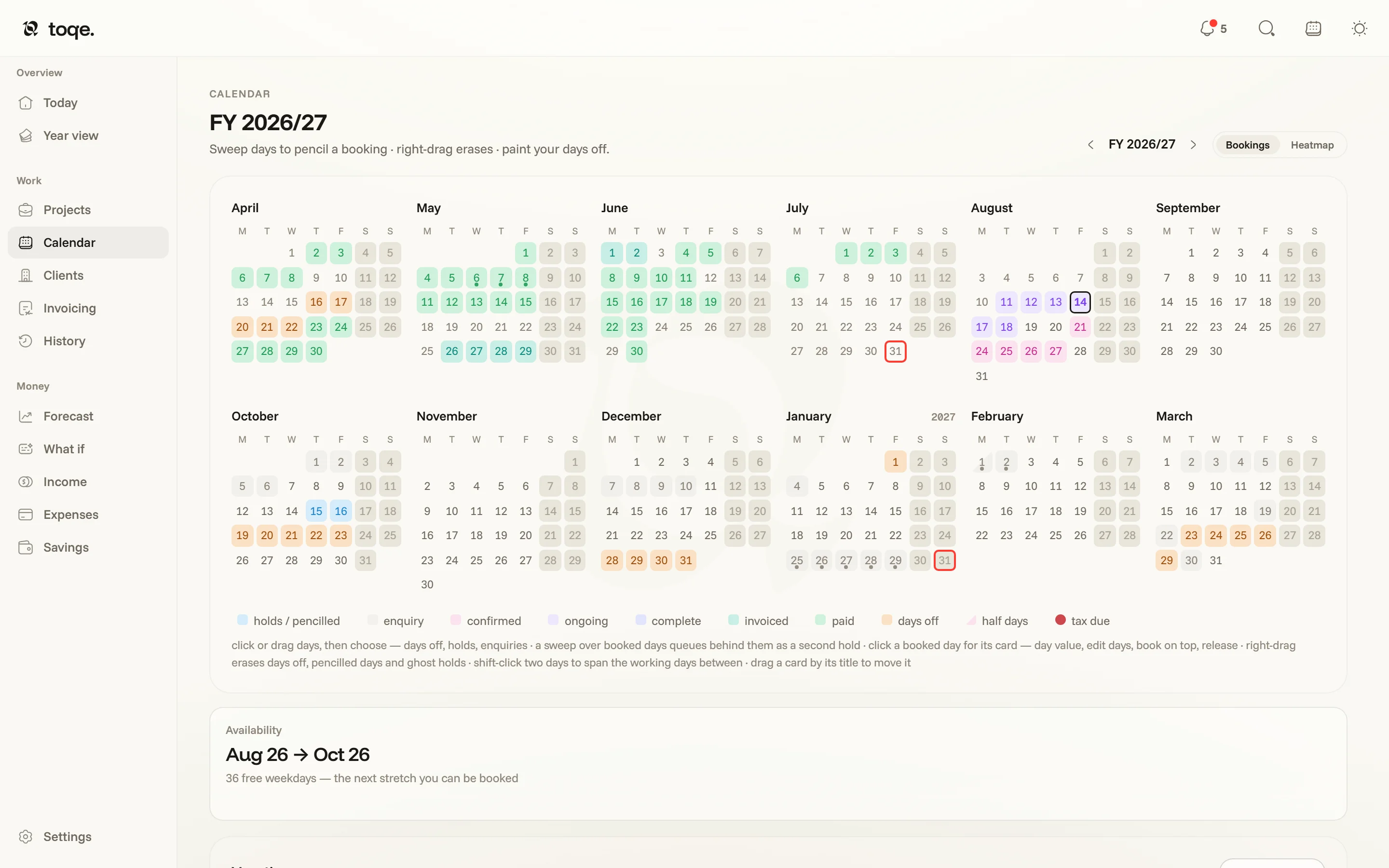 The Bookings calendar — a fiscal year of days wearing their status colours, with the legend beneath